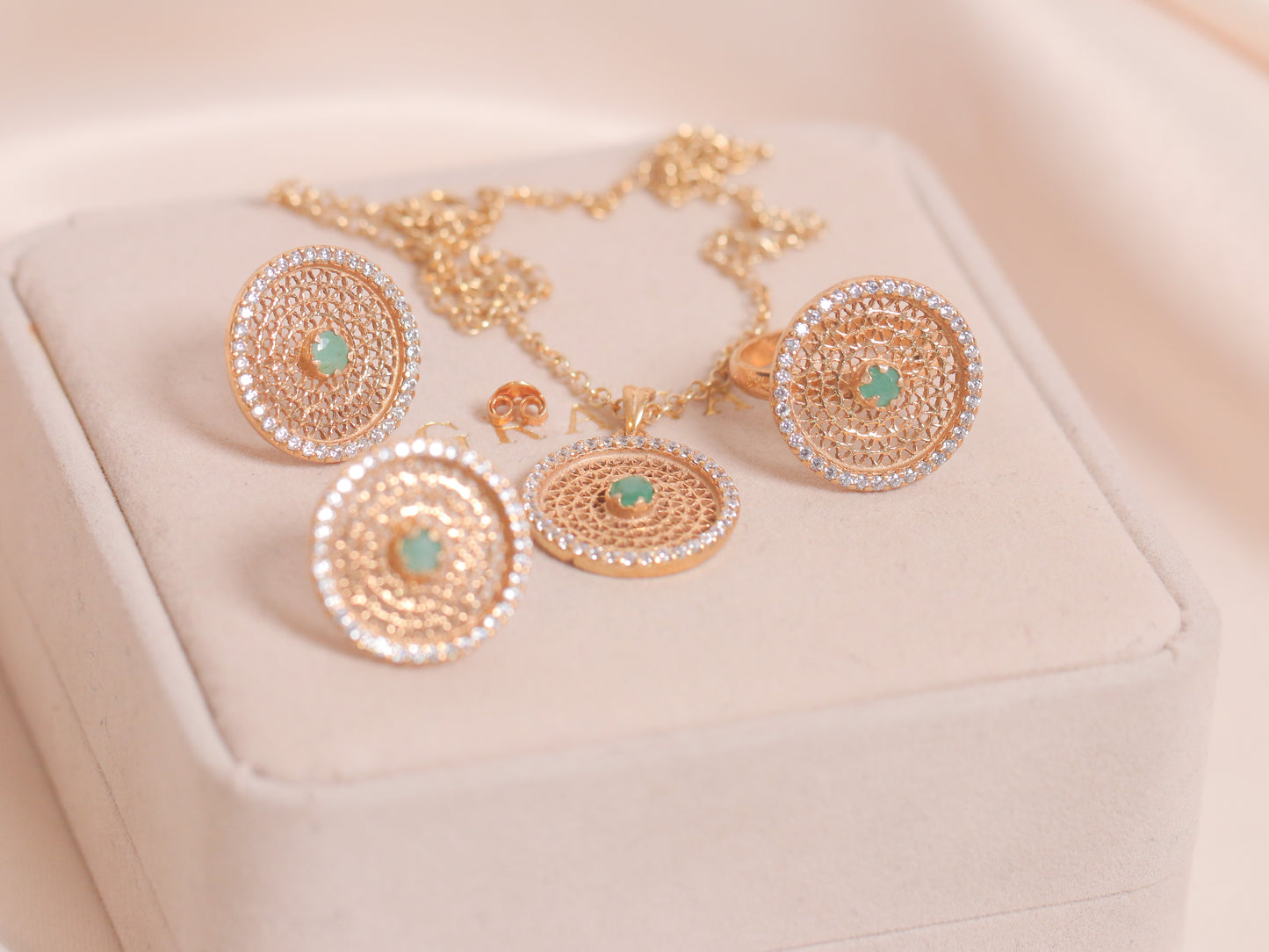 Min Emeralds With Zircon Set